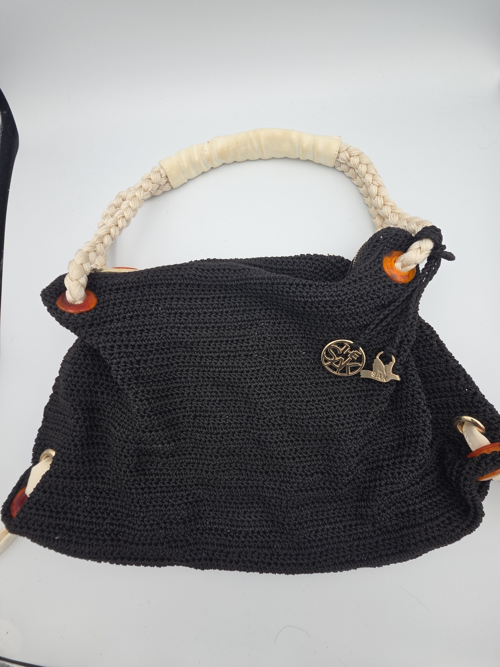 The Sak Limited Edition Black Crochet Shoulder Bag with Cream Braided Handle